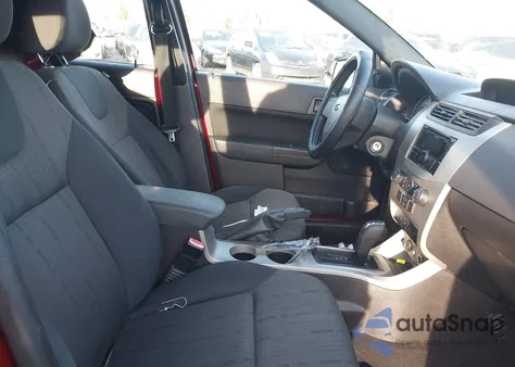 2009 Ford Focus Se z USA, uszkodzony, nr VIN 1FAHP35NX9W270633